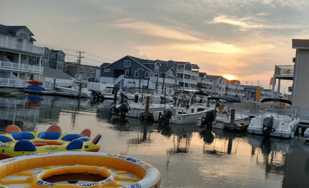 Sunset over the boats and lagoon behind Marie’s Seafood